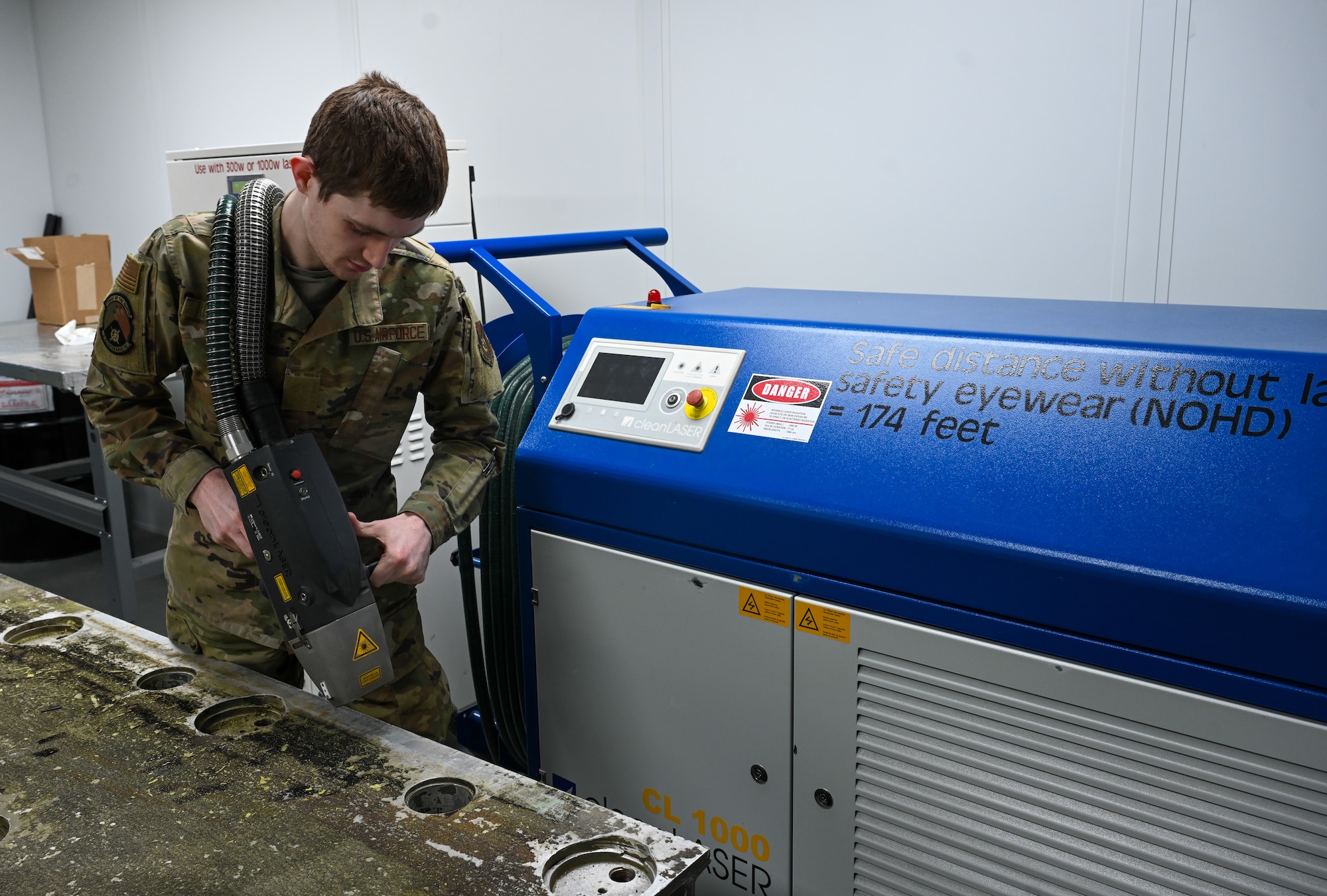 Laser technology enhances corrosion control for JBER Airmen