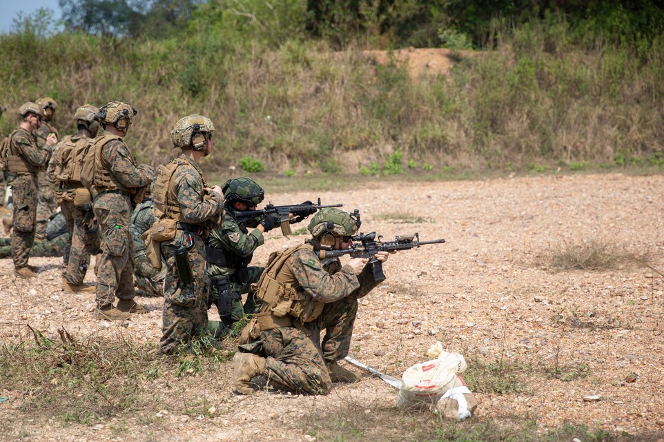 U.S. Marines, with 1st Light Armored Reconnaissance Battalion, 1st Marine Division, and service members from the Royal Thai Marine Corps and Republic of Korea Marine Corps conduct a live-fire short bay range at Thai Reconnaissance Battalion, Sattahip, Thailand, Feb. 28, 2025, during exercise Cobra Gold.