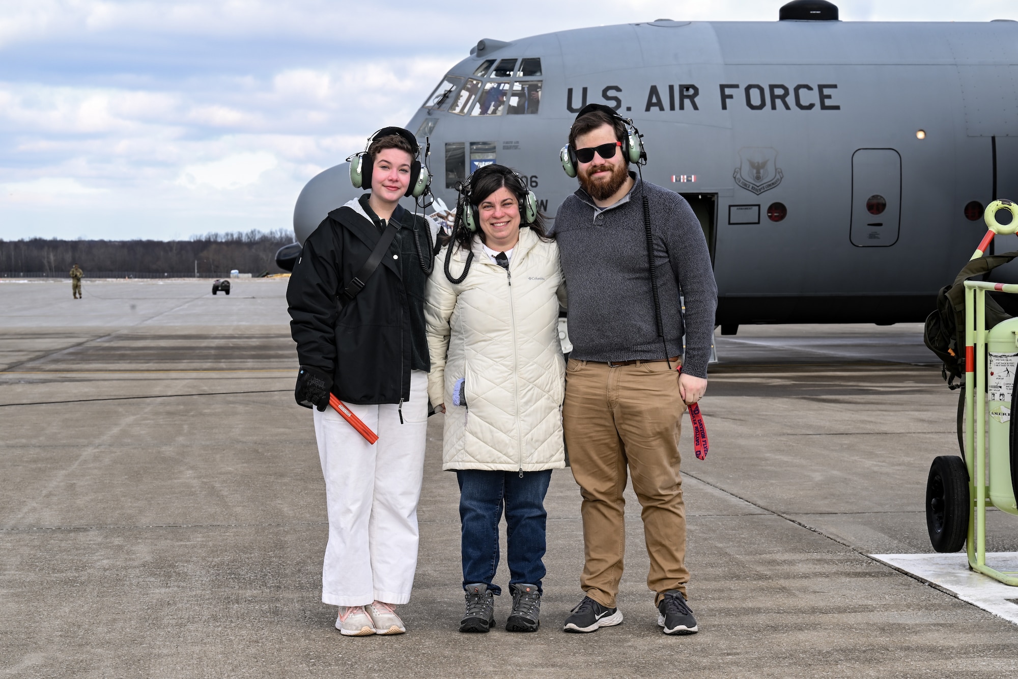 Family of Col. Michael Maloney, 910th Airlift Wing commander, pose for a photo as he conducts preflight operations prior to taking off for his “fini-flight” at Youngstown Air Reserve Station, Ohio, March 2, 2025.