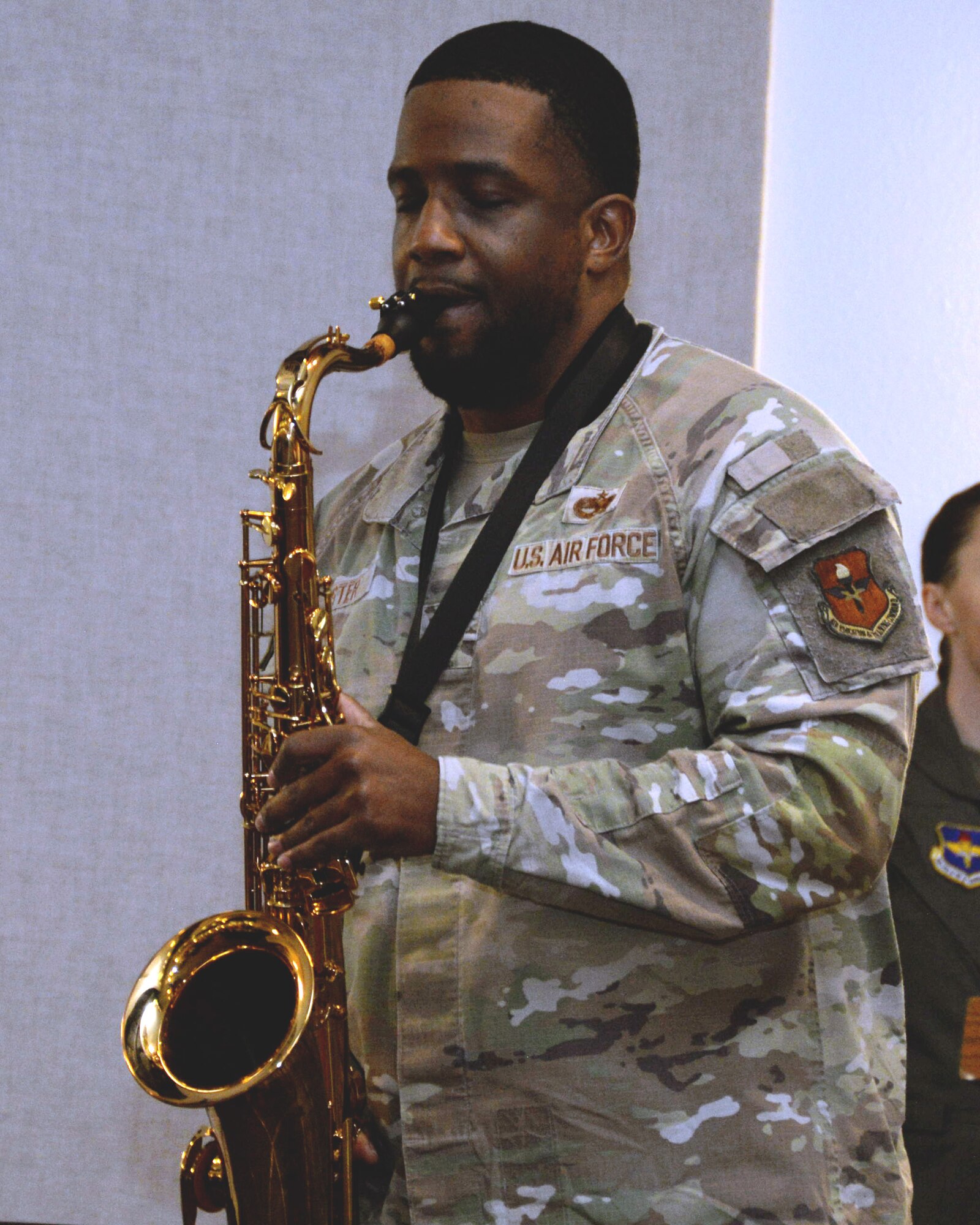 Tech. Sgt. Ernest Foster Jr. plays the National Anthem on saxophone during the National Prayer Breakfast, February 19, 2025