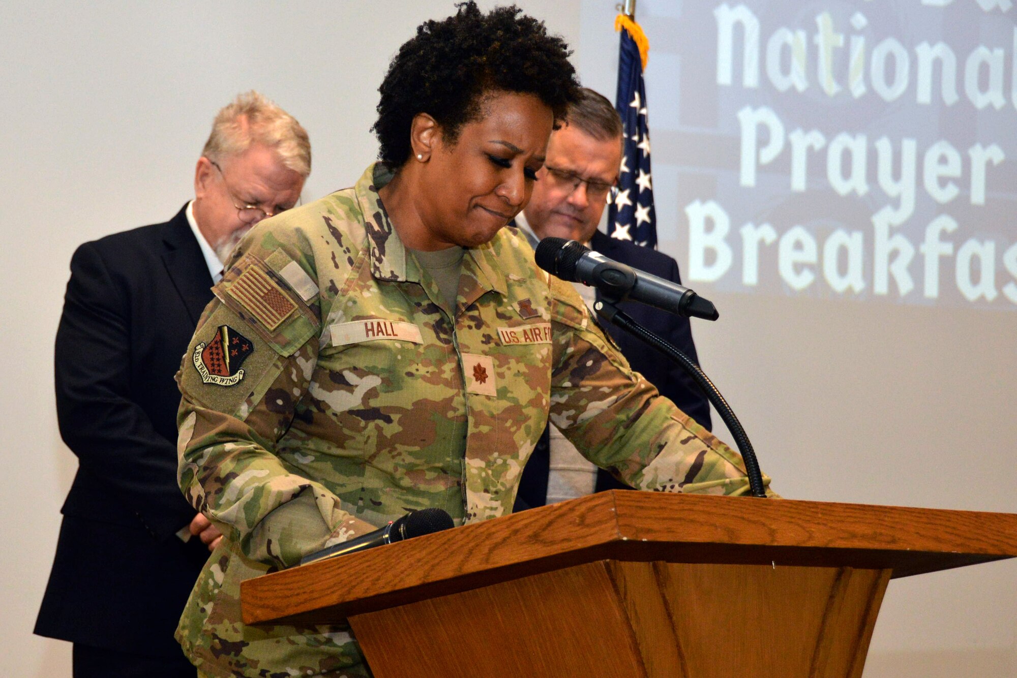Chaplain Maj. Kimberly Hall, 82d Training Wing Chaplain, delivers a prayer during the National Prayer Breakfast, February 19, 2025