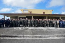 Guam March 3, 2025 – Sea Dragon 25 participants, including Maritime Patrol and Reconnaissance Aircraft (MPRA) communities from the Royal Australian Air Force (RAAF), Japan Maritime Self-Defense Force (JMSDF), Republic of Korea Navy (ROKN), and the United States Navy, pose for a group photo during opening ceremony and exercise commencement.