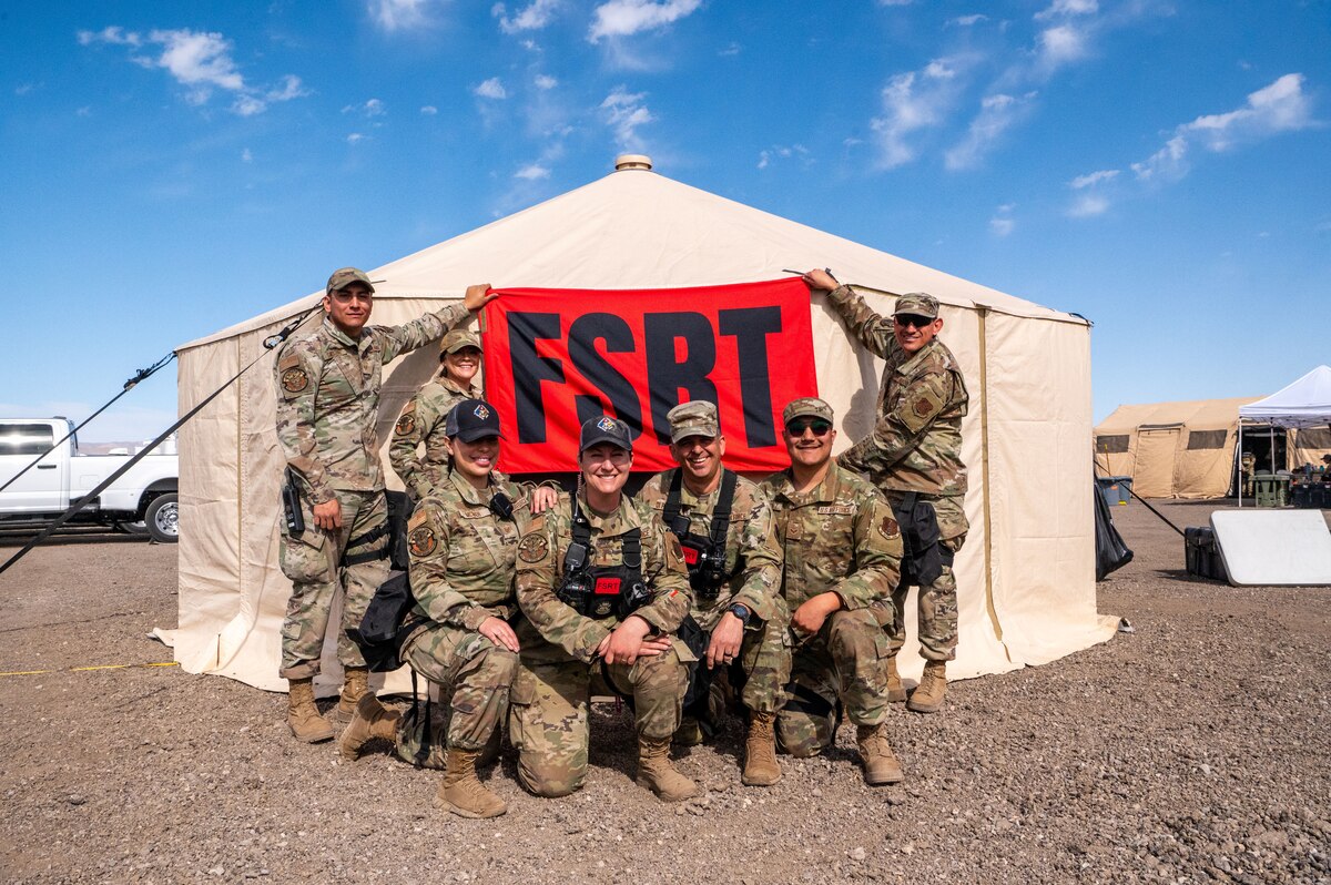 Members of the 162nd Wing Fatality Search and Recovery Team gather during the Nevada Chemical, Biological, Radiological, Nuclear Enhanced Response Force Package Sustainment Year Combined Training Event at Nellis Air Force Base, Mar. 1, 2025. Joint exercises, such as the Nevada CBRN CERFP SYCTE emphasize the necessity of readiness and precision, aligning with the 162nd Wing's mission to provide combat-ready Airmen for homeland defense and global operations. (U.S,. Air National Guard photo by Tech. Sgt. Van Whatcott)