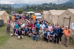 Joint Task Force-Bravo, Costa Rica Emergency Medical Team, and local community members pose for a group photo after a Medical Readiness Training Exercise in Pejibaye, Costa Rica, February 27, 2025.