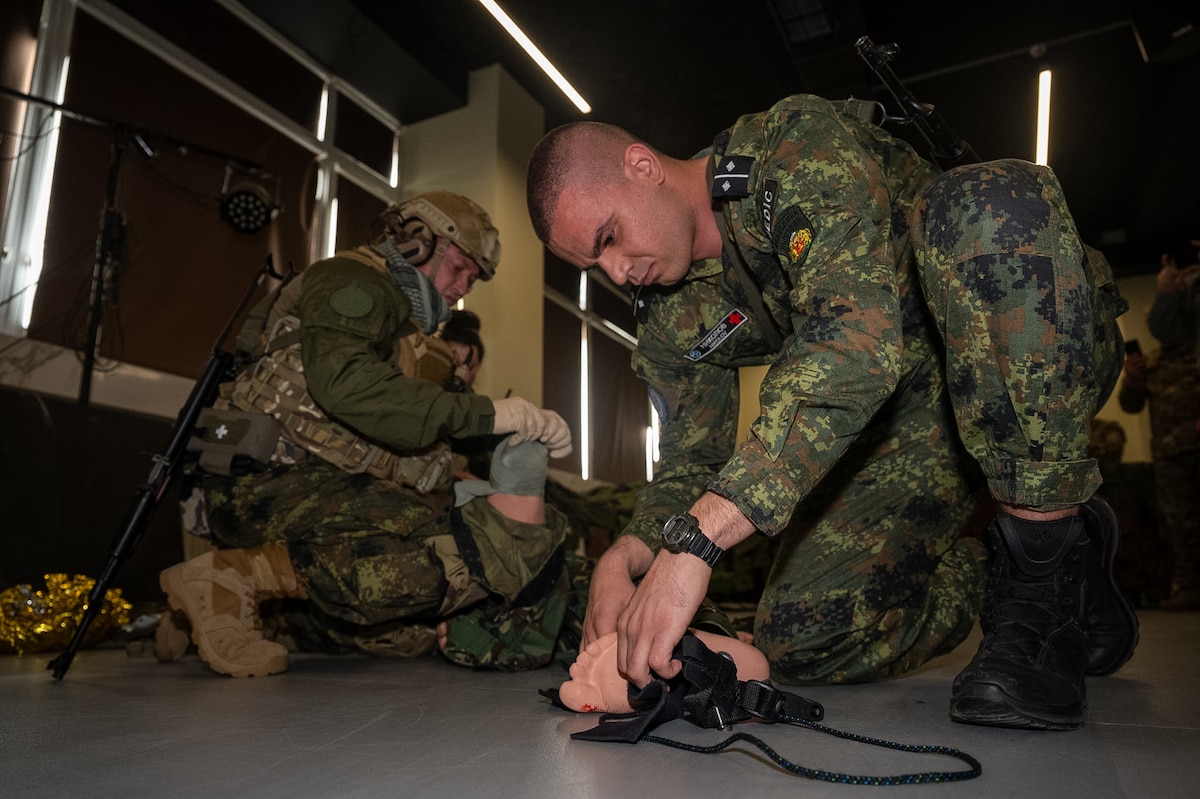 participants tend to a simulated wounded military personnel