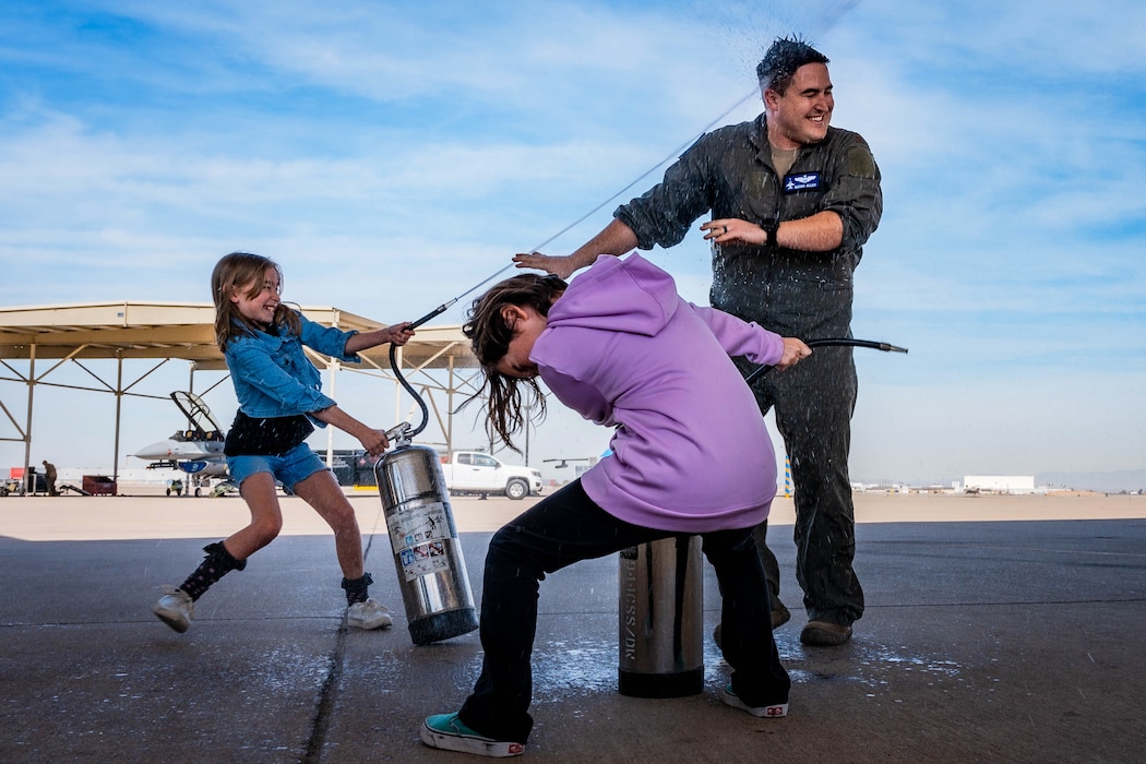 Spraying water at Airman