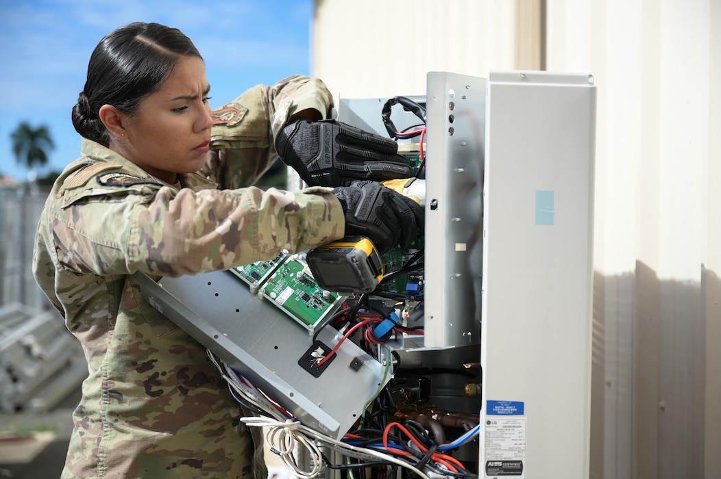 Airman working on machine