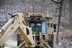 Kentucky National Guard Soldiers from the 207th Engineer Construction Company, 149th Maneuver Enhancement Brigade, aided in flood relief efforts in Leslie County Feb. 22, 2025. They cleared and reconstructed roads.