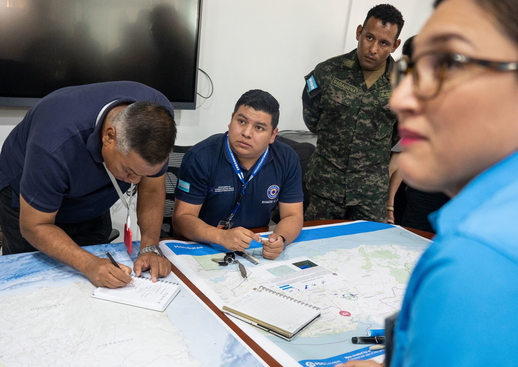 Participants from three Honduran partner agencies respond to the first inject during Jaguar Sentinel, a JTF-Bravo led tabletop exercise Feb. 28, 2025, Tegucigalpa, Honduras. Jaguar Sentinel is a forum for key players to share experience, capabilities and act as force multipliers during a crisis. (U.S. Air Force photo)