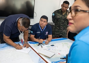 Participants from three Honduran partner agencies respond to the first inject during Jaguar Sentinel, a JTF-Bravo led tabletop exercise Feb. 28, 2025, Tegucigalpa, Honduras. Jaguar Sentinel is a forum for key players to share experience, capabilities and act as force multipliers during a crisis. (U.S. Air Force photo)