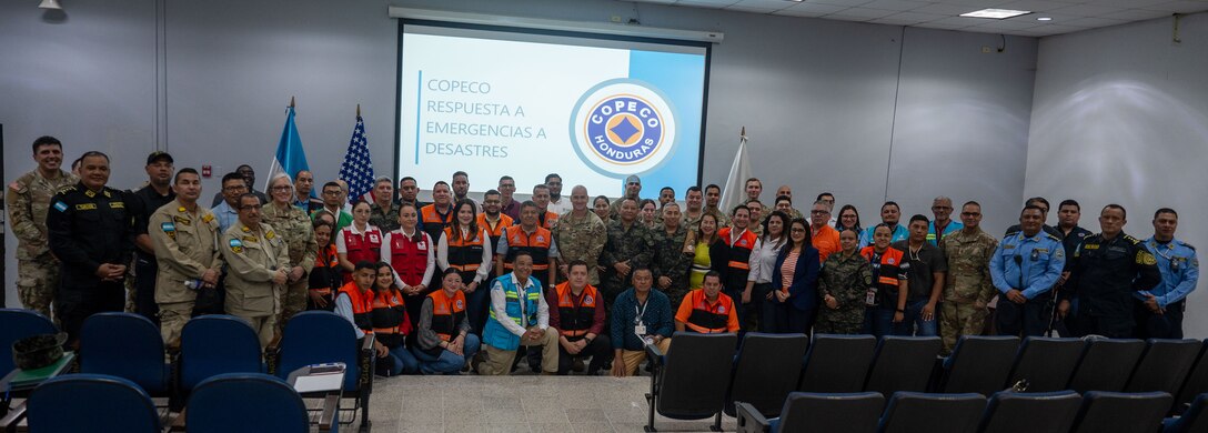 Exercise participants gather for a group photo during Jaguar Sentinel, a JTF-Bravo led tabletop exercise Feb. 28, 2025, Tegucigalpa, Honduras. Jaguar Sentinel is a forum for key players to share experience, capabilities and act as force multipliers during a crisis. (U.S. Air Force photo)