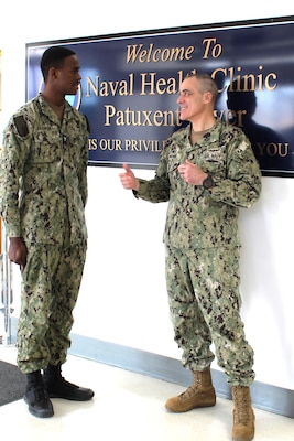 Rear Admiral Kevin Brown, Commander Medical Forces Atlantic, Visits Navy Medicine Readiness and Training Command Patuxent River and speaks with HM3 Rickey Samuels from the Military Readiness Clinic. HM3 Samuels was recognized by RDML Brown for his strong leadership qualities, professional demeanor and positive reflection of Navy Medicine.