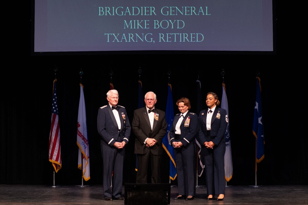 U.S. Army retired Brig. Gen. Mike Boyd is awarded the Defense Community Champion Award during the 2024 Annual Awards Ceremony at Murphey Performance Hall, San Angelo, Texas, Feb. 29, 2025. Boyd helped strengthen the bond between Goodfellow and the city of San Angelo by advocating for the needs of service members and veterans in multiple leadership positions across San Angelo. (U.S. Air Force photo by Airman 1st Class Brian Lummus)