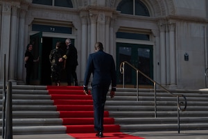 U.S. Air Force Capt. Kizito Okhuoya, 17th Training Wing chaplain, walks towards the entrance of the 2024 Annual Awards Ceremony at Murphey Performance Hall, San Angelo, Texas, March 1, 2025. Annual awards are an opportunity to recognize personnel for their service, hard-work, initiative, and dedication throughout the year. (U.S. Air Force photo by Airman 1st Class Brian Lummus)