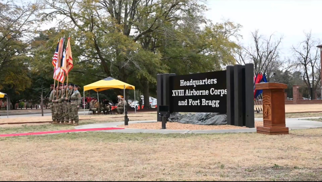A large outdoors sign reads, "Headquarters XVIII Airborne Corps and Fort Bragg."