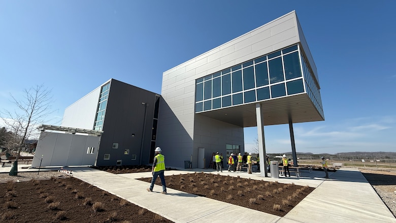 The U.S. Army Corps of Engineers Nashville District symbolically turned over the key to the new K-25 Interpretive Center March 4, 2025, to the U.S. Department of Energy Office of Environmental Management. USACE has completed construction of the new building that now provides a historic lookout over the 44-acre footprint where the K-25 Building once stood, and the Oak Ridge Diffusion Plant produced uranium during World War II as part of the Manhattan Project.