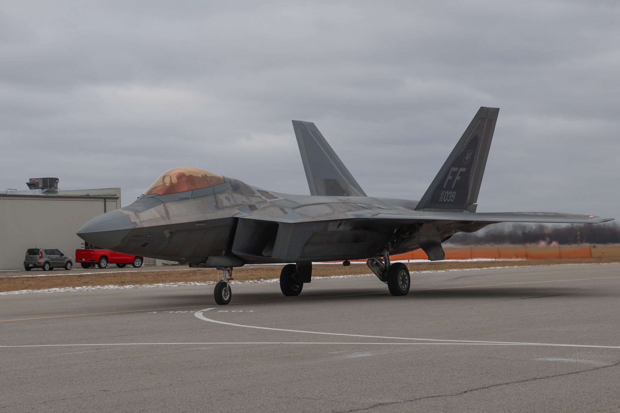 An F-22 Raptor aircraft taxiing
