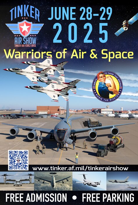 KC-135 aircraft being worked on with Thunderbirds flying overhead