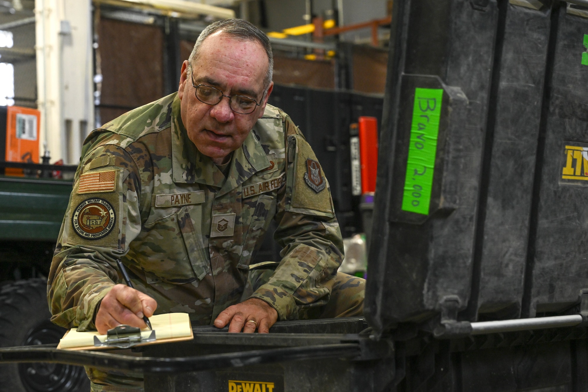 Master Sgt. Dale Payne, NCOIC of civil engineering and force support with the Department of Defense’s Innovative Readiness Program Combined Asset Management Site, logs items while inventorying an equipment case at the CAMS warehouse March 2, 2025.