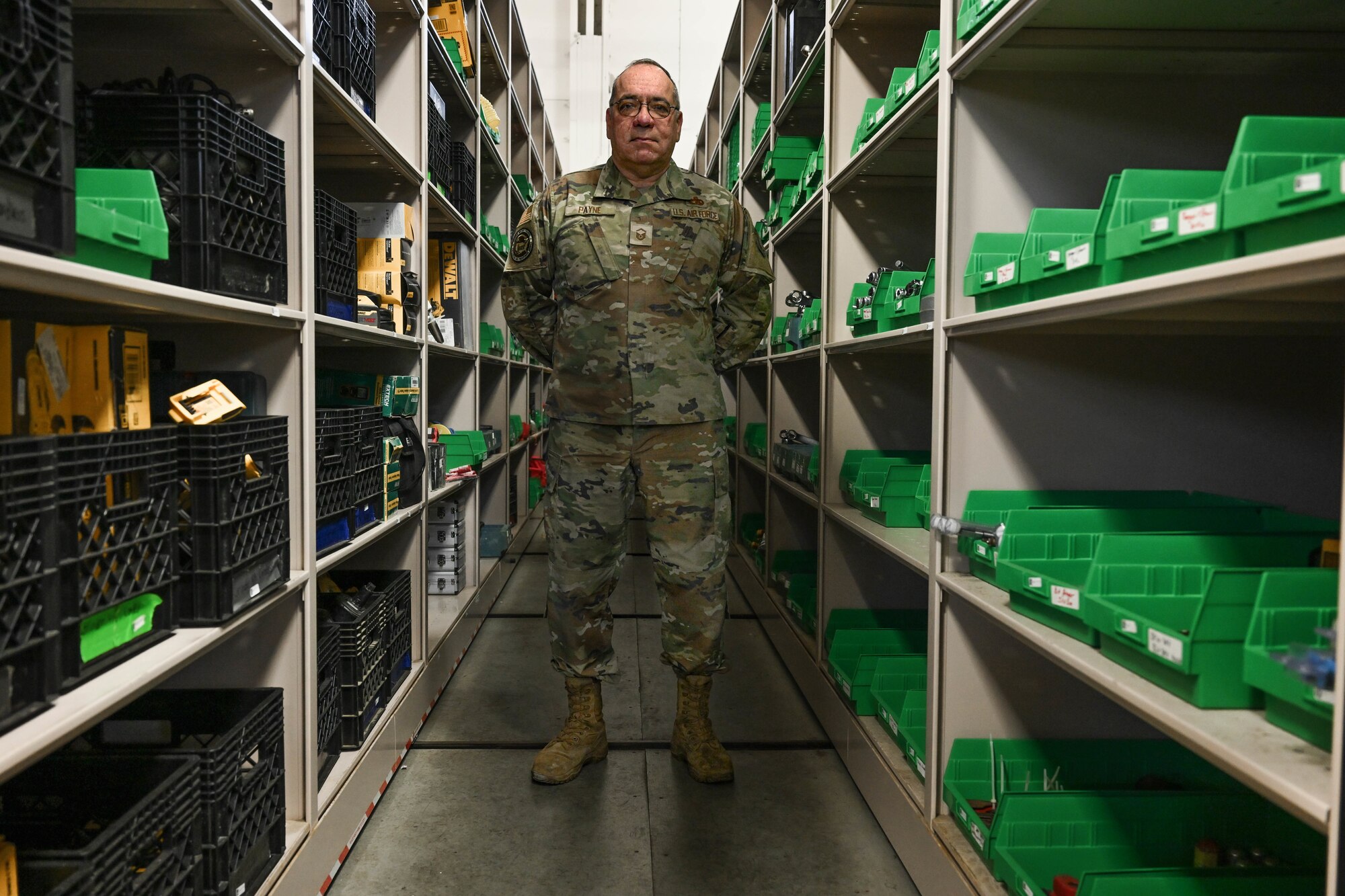 Master Sgt. Dale Payne, NCOIC of civil engineering and force support with the Department of Defense’s Innovative Readiness Program Combined Asset Management Site, poses for a photo at the CAMS warehouse March 2, 2025.