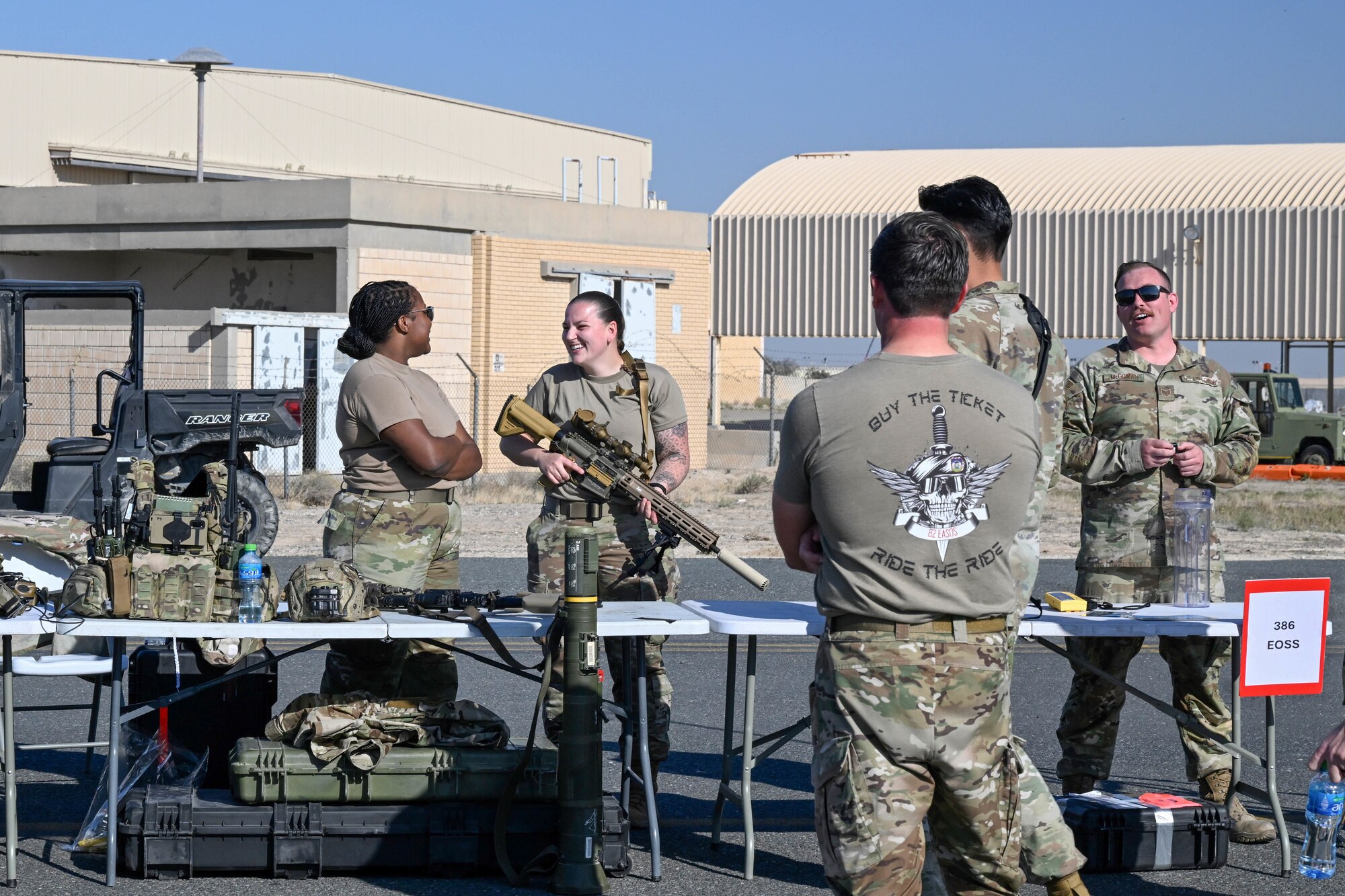 People in uniform talk with eachother.