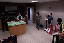 U.S. Air Force Chief Master Sgt. Ralph Oliver, 1st Special Operations Wing command chief, provides opening remarks before a Cooking with Command event at Hurlburt Field, Florida, Feb. 11, 2025.