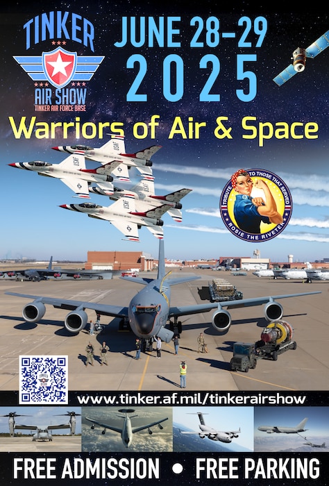 KC-135 aircraft being worked on with Thunderbirds flying overhead