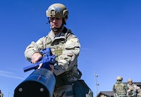 An Airman clears a training rifle.