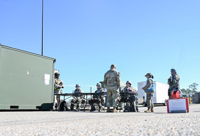 Airmen set up a weapons cache.