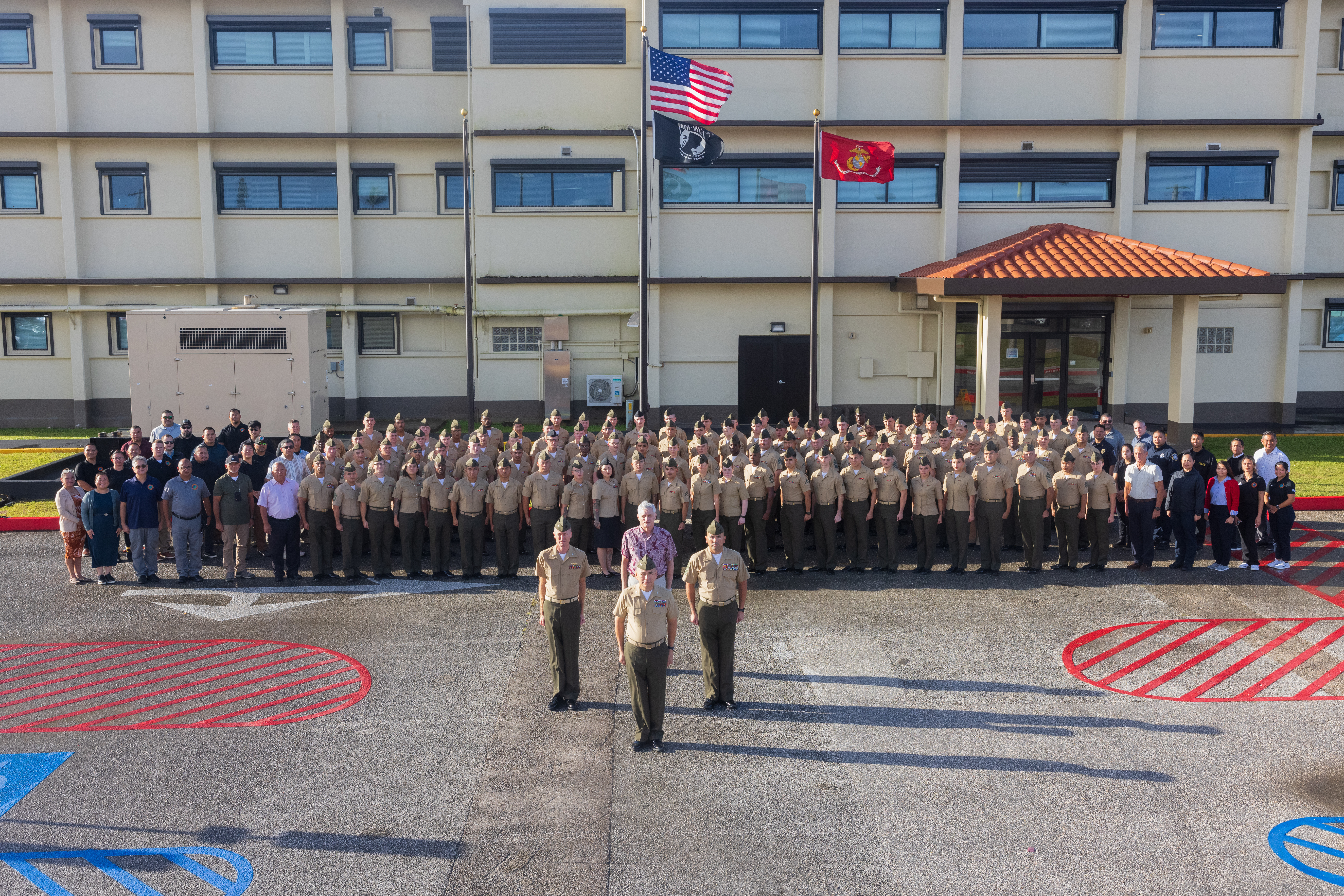 U.S. Marines, sailors, and civilians with Marine Corps Base Camp Blaz pose for a group photo on MCB Camp Blaz, Guam, March 4, 2025. (U.S. Marine Corps Photo by Cpl. Brayden Daniel)