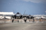 (March 8, 2025) U.S. Marine Corps F-35B Lightning II aircraft with Marine Fighter Attack Squadron (VMFA) 214, Marine Aircraft Group 13, 3rd Marine Aircraft Wing taxi the flight line after arriving at Marine Corps Air Station Iwakuni, Japan, March 8, 2025. VMFA-214, an F-35B squadron from MCAS Yuma, Arizona, deployed to augment MAG-12, 1st MAW under the Unit Deployment Program, which provides U.S.-based units with operational experience in the Indo-Pacific. Their arrival marked the start of the Marine Corps’ transition from the F/A-18 Hornet to the F-35 for rotational deployments to the region. (U.S. Marine Corps photo by Cpl. Samantha Rodriguez)