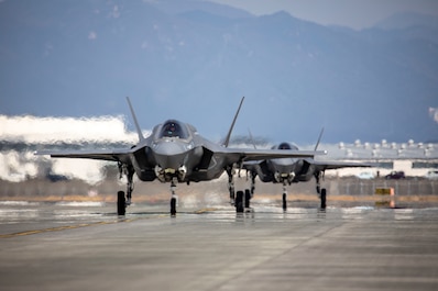 YAMAGUCHI, Japan (March 8, 2025) — U.S. Marine Corps F-35B Lightning II aircraft with Marine Fighter Attack Squadron (VMFA) 214, Marine Aircraft Group 13, 3rd Marine Aircraft Wing taxi the flight line after arriving at Marine Corps Air Station Iwakuni, Japan, March 8, 2025. VMFA-214, an F-35B squadron from MCAS Yuma, Arizona, deployed to augment MAG-12, 1st MAW under the Unit Deployment Program, which provides U.S.-based units with operational experience in the Indo-Pacific. Their arrival marked the start of the Marine Corps’ transition from the F/A-18 Hornet to the F-35 for rotational deployments to the region. (U.S. Marine Corps photo by Cpl. Samantha Rodriguez)