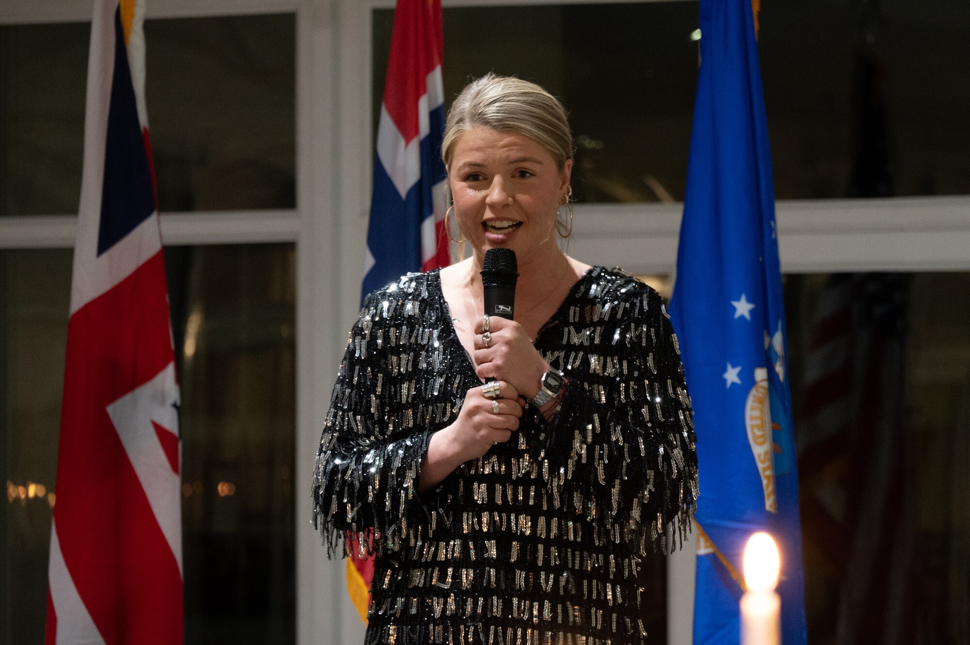 Abi Carter-Simpson, singer and musician, performs during the dinner portion