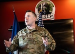 Lt. Col. Robert M. Lee speaks to a crowd of 91st Cyber Brigade Soldiers, family, friends and supporters, as part of his direct commissioning ceremony March 1, 2025, at 91st headquarters, Fort Belvoir, Va. Lee, an internationally-known expert in cybersecurity and operational technology, is the first cyber professional to direct commission to lieutenant colonel in the Army National Guard.