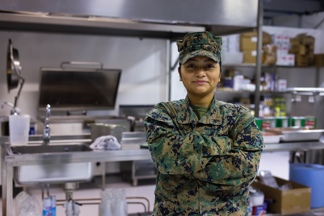 U.S. Marine Lance Cpl. Alondra RuizHernandez, a food service specialist with Headquarters and Service Battalion, 2nd Marine Logistics Group, poses for a photo in Setermoen, Norway, March 5, 2025. RuizHernandez was selected as the 2nd MLG Warrior of the Week for her hard work, dedication and leadership while preparing and serving meals to over 250 service members participating in Exercise Joint Viking 25. When asked what keeps her motivated she said, “I enjoy knowing that people are fed, and morale is high.” Each week, 2nd MLG recognizes one outstanding Marine or Sailor that goes above and beyond in their duties and embodies the qualities of an outstanding service member. (U.S. Marine Corps Photo by Sgt. Gavin Umboh)