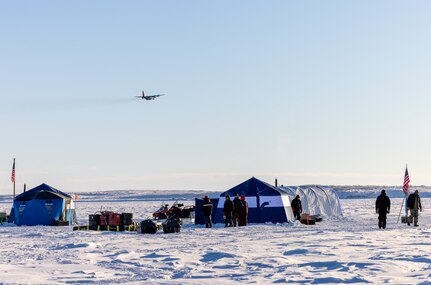 A LC-130 Hercules assigned to the 109th Airlift Wing flies over Parsons Lake, Northwest Territories, Canada, March 4, 2025. The LC-130 Hercules can land on snow and ice using skis.