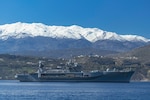 NAVAL SUPPORT ACTIVITY SOUDA BAY, Greece (March 10, 2025) The Blue Ridge-class command and control ship USS Mount Whitney (LCC 20) arrives at the NATO Marathi Pier Complex in Souda Bay, Greece, for a scheduled port visit on March 10, 2025. Mount Whitney is conducting operations in the U.S. 6th Fleet area of operations, where the ship's crew and embarked staff will work alongside allies and partners in support of maritime operations, which encompass naval diplomacy and national efforts to build comprehensive maritime power. NSA Souda Bay is an operational ashore installation that enables and supports U.S., Allied, Coalition, and partner nation forces to preserve security and stability in the European, African, and Central Command areas of responsibility. (U.S. Navy photo by Mass Communication Specialist 2nd Class Andrew Eder)
