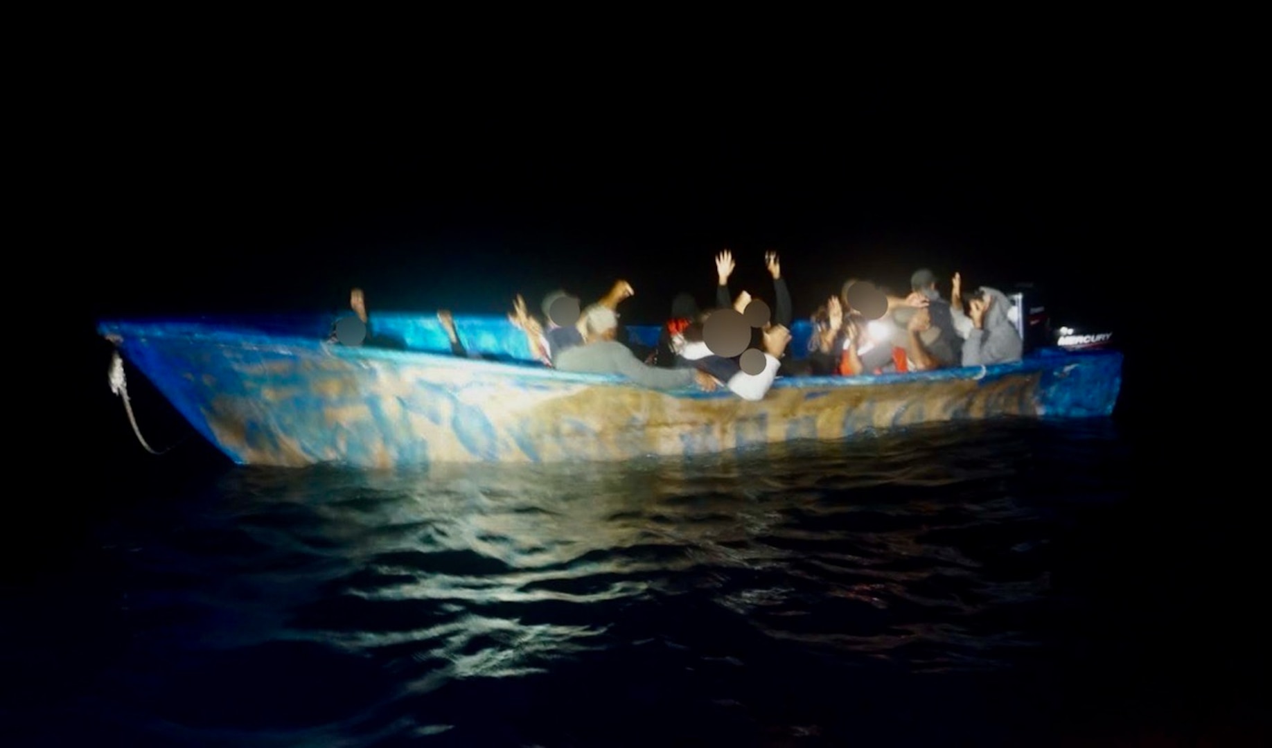 The crews of Coast Guard Cutter Joseph Napier and a Coast Guard HC-144 Ocean Sentry aircraft interdict 32 aliens aboard an overloaded makeshift vessel in Mona Passage waters near the Dominican Republic, March 8, 2025.  The aliens were transferred to the Dominican Republic Navy vessel Aldebaran for their return to Dominican Republic. (U.S. Coast Guard photo)