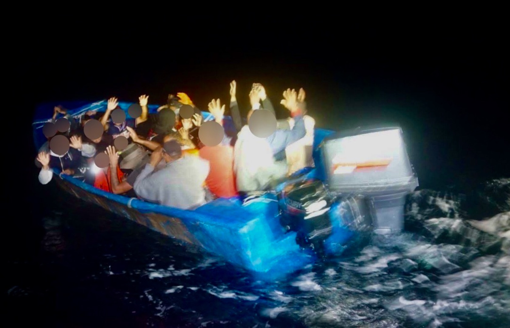 The crews of Coast Guard Cutter Joseph Napier and a Coast Guard HC-144 Ocean Sentry aircraft interdict 32 aliens aboard an overloaded makeshift vessel in Mona Passage waters near the Dominican Republic, March 8, 2025.  The aliens were transferred to the Dominican Republic Navy vessel Aldebaran for their return to Dominican Republic. (U.S. Coast Guard photo)