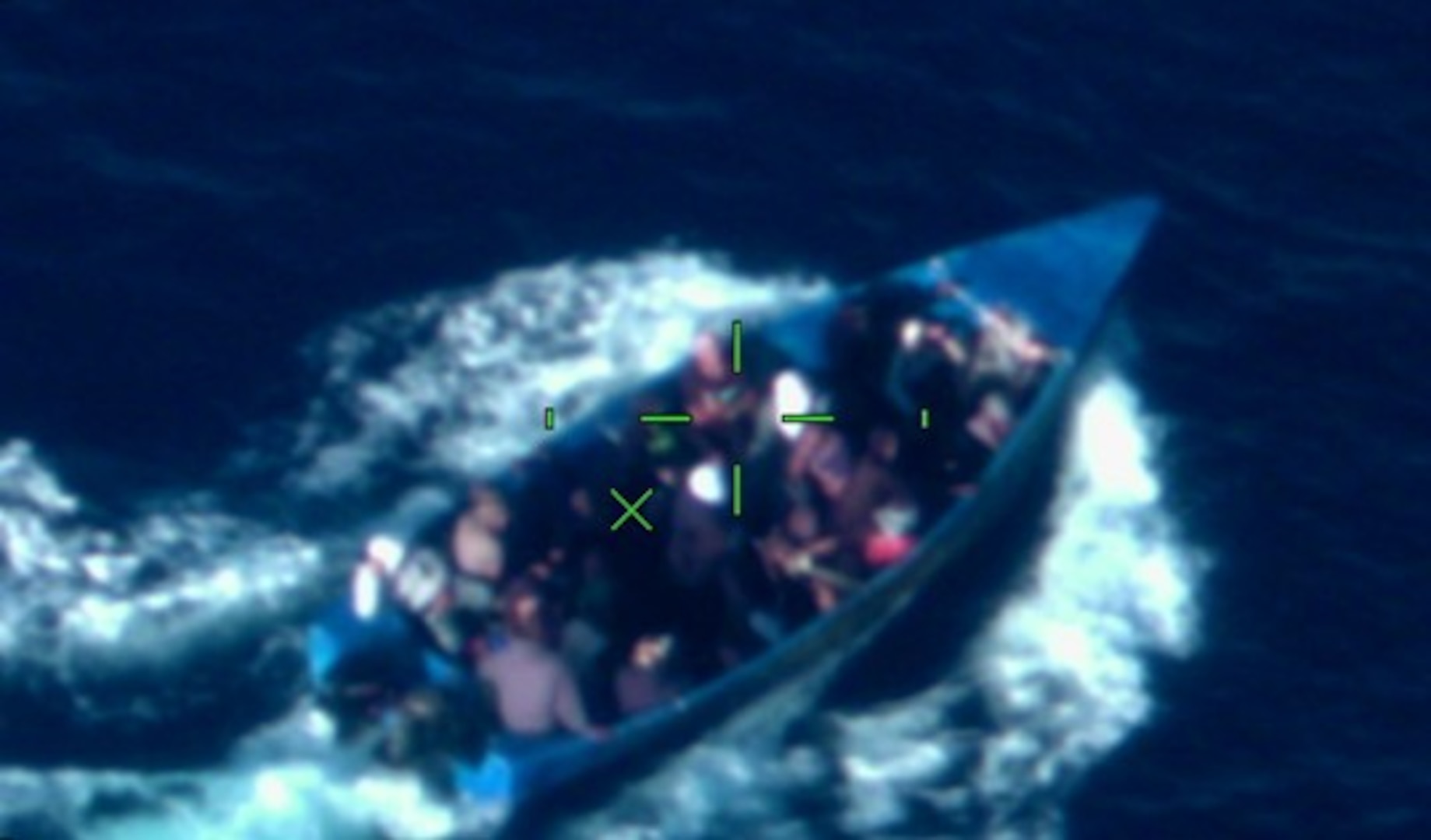 The crews of Coast Guard Cutter Joseph Napier and a Coast Guard HC-144 Ocean Sentry aircraft interdict 32 aliens aboard an overloaded makeshift vessel in Mona Passage waters near the Dominican Republic, March 8, 2025.  The aliens were transferred to the Dominican Republic Navy vessel Aldebaran for their return to Dominican Republic. (U.S. Coast Guard photo)