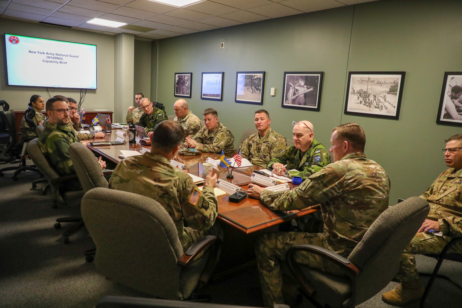 New York National Guard and Swedish military members meet during a State Partnership Program engagement at New York National Guard headquarters in Latham, N.Y., Feb. 27, 2025. The State Partnership Program pairs state National Guards with the militaries of countries around the world in bilateral training and exchange partnerships.