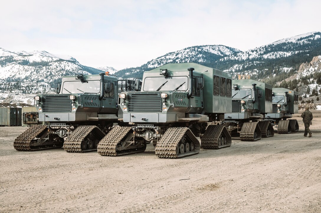 U.S. Marines with Combat Logistics Battalion 6, Combat Logistics Regiment 2, 2nd Marine Logistics Group, stage Tucker Sno-Cats before transporting cargo during Mountain Training Exercise 2-25 at Marine Corps Mountain Warfare Training Center Bridgeport, California, March 4, 2025. MTX 2-25 is designed to prepare units to strengthen expeditionary warfare tactics and build confidence in their abilities to operate in a cold weather, high-altitude, mountainous environment. (U.S. Marine Corps photo by Sgt. Mary Torres)