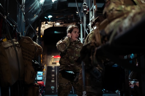 An airman speaks over her communications system during a FuT exercise.