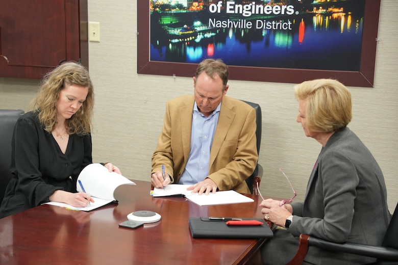 From left to right, U.S. Army Corps of Engineers Nashville District Real Estate Division Chief Cathy Keith, Foxland Harbor Marina LLC President Bob Goodall, Foxland Harbor Marina LLC Managing Member Susan Steen, sign lease agreement documents for the approved Foxland Marina project in the District office in Nashville, Tennessee, March 6, 2025.