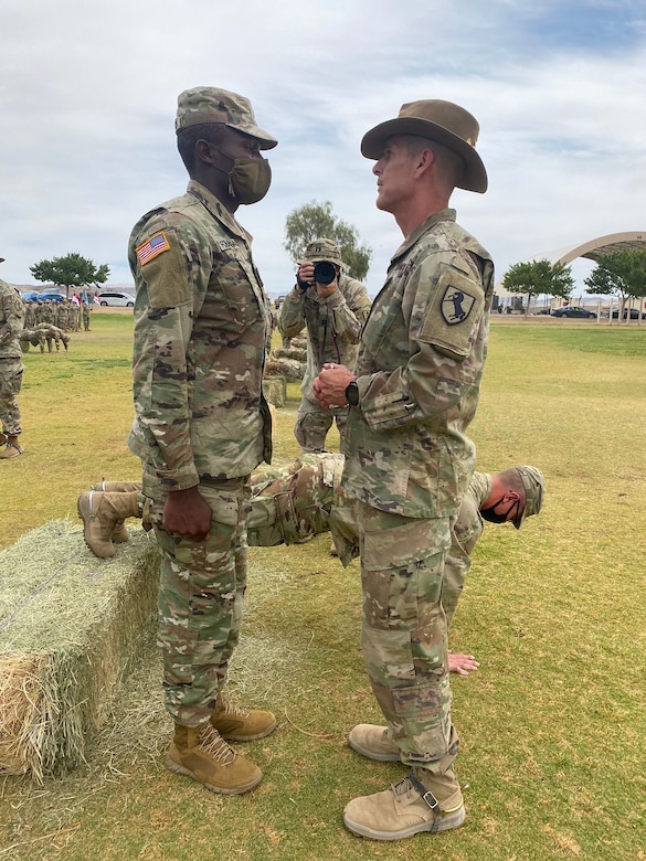 U.S. Army Soldier participating in the "Earning my Suprs" tradition for the 19D Calvary Scouts