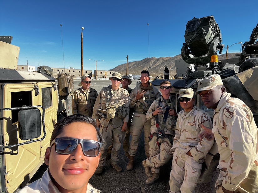 U.S. Army Soldiers pose together while on deployment, getting ready to return home.