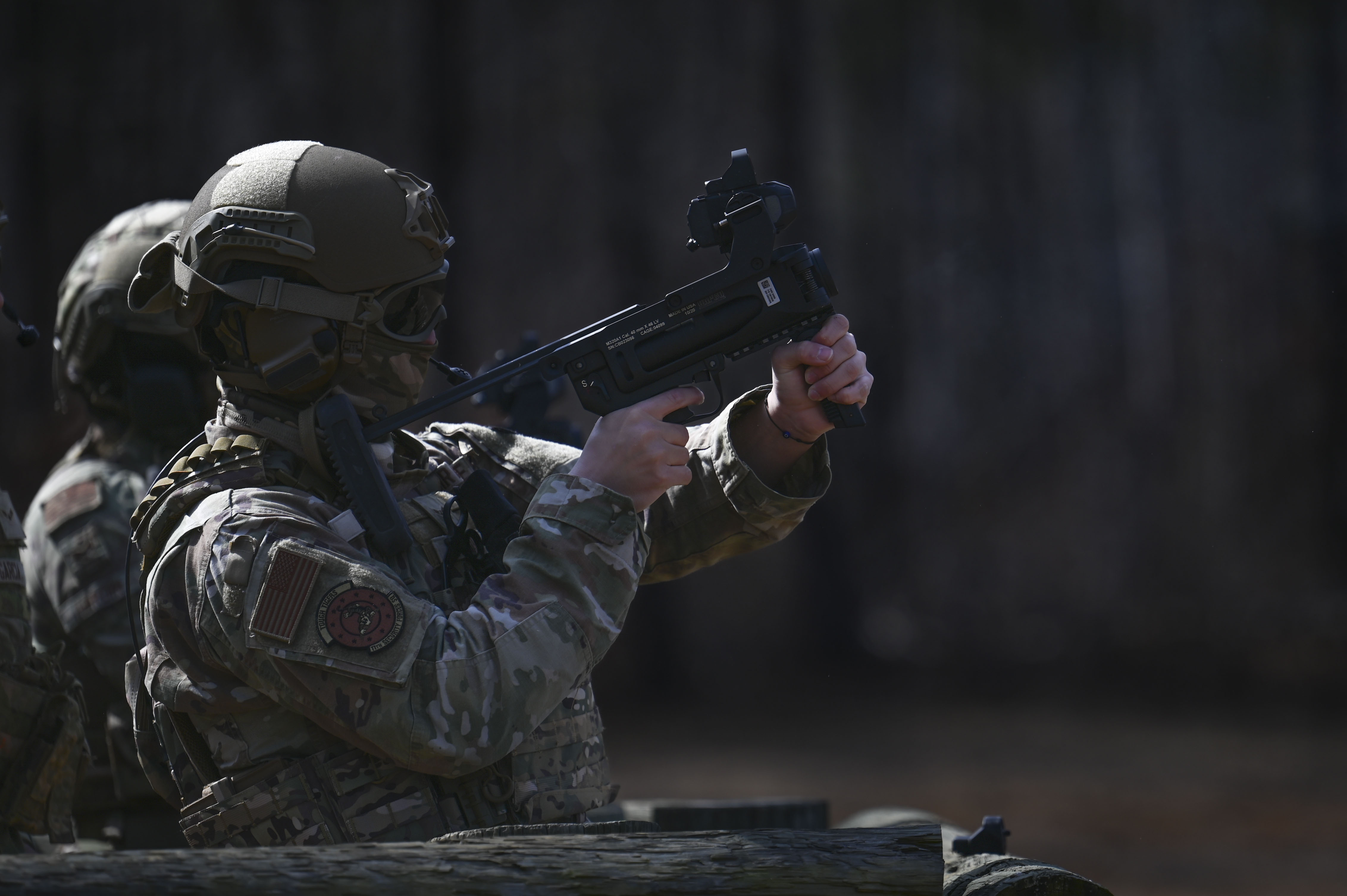 U.S. Air Force Airman 1st Class Mahmoud Ramadan, security forces specialist assigned to the 11th Security Forces Squadron, fires a grenade launcher during heavy weapons training at Marine Corps Base Quantico, Va., March 4, 2025. The training prepared security forces members for Mission Focused Rehearsal Training at Fort Bliss, Texas, where they will be challenged with a realistic representation of a deployed environment. (U.S. Air Force Airman 1st Class Geneva Nguyen)
