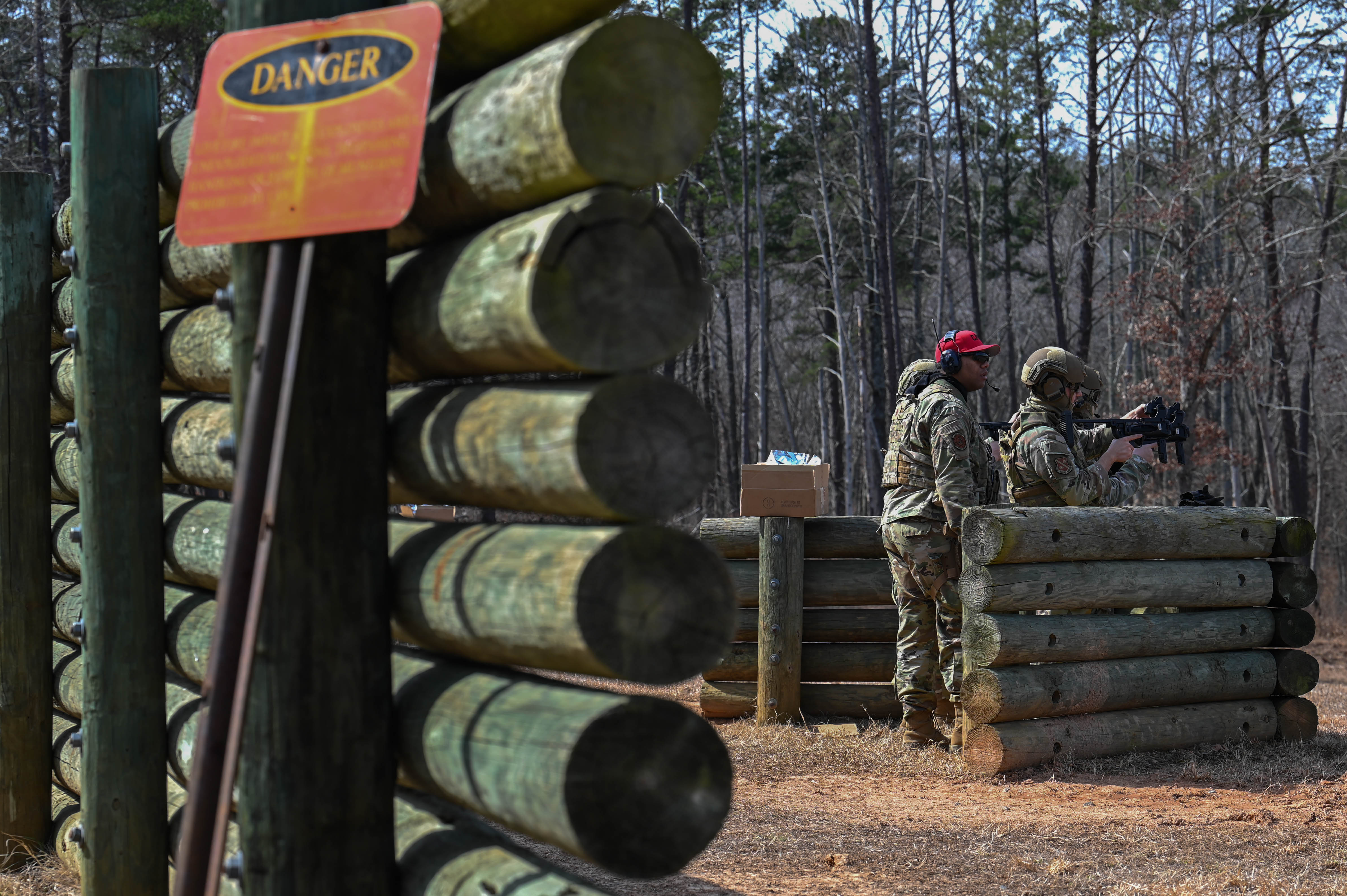 Members of the 11th Security Forces Squadron train to qualify on heavy weapons at Marine Corps Base Quantico, Va., March 4, 2025. The training prepared security forces members for Mission Focused Rehearsal Training at Fort Bliss, Texas, where they will be challenged with a realistic representation of a deployed environment. (U.S. Air Force Airman 1st Class Geneva Nguyen)