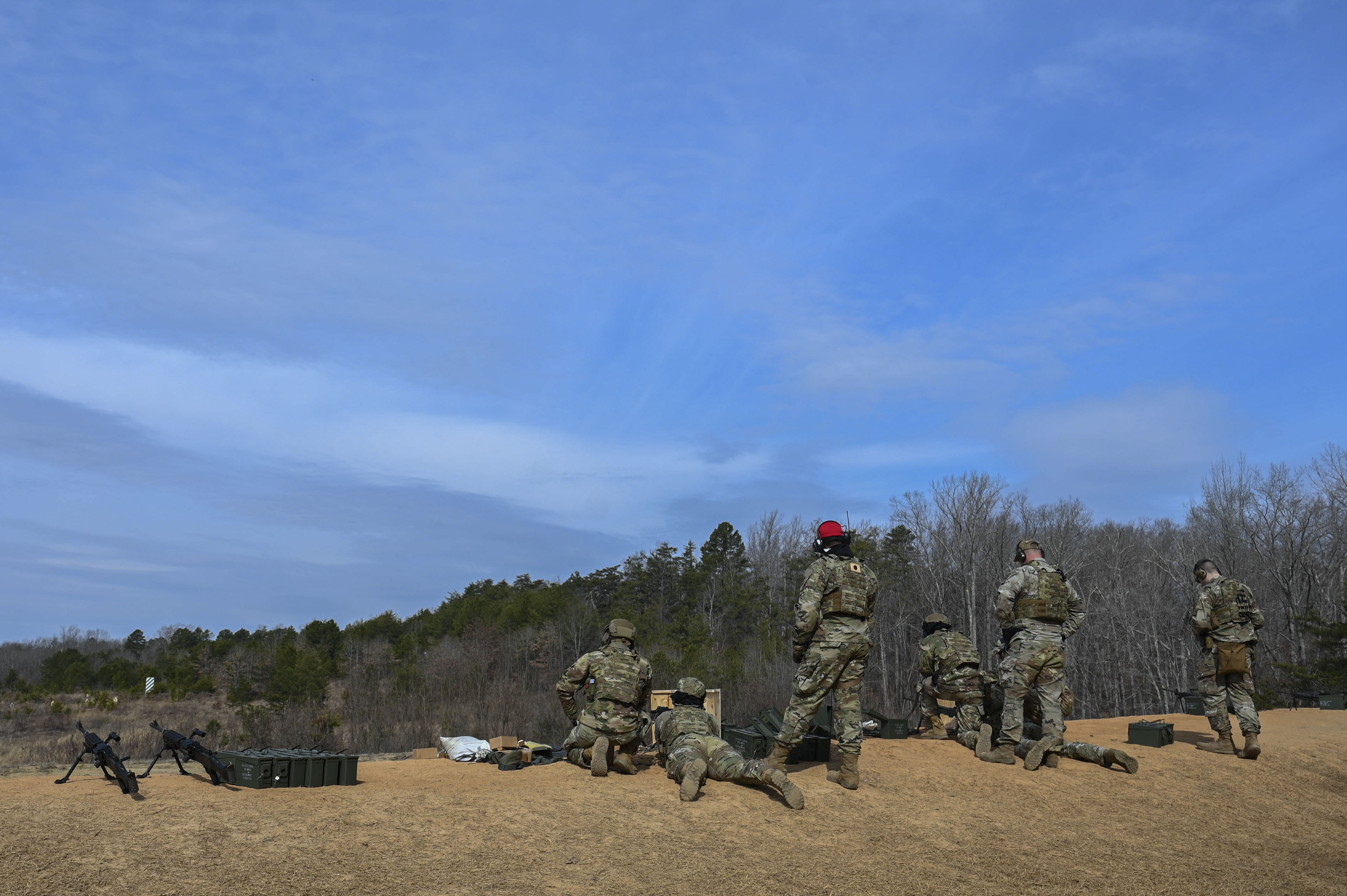 Members of the 11th Security Forces Squadron train to qualify on heavy weapons at Marine Corps Base Quantico, Va., March 4, 2025. The training prepared security forces members for Mission Focused Rehearsal Training at Fort Bliss, Texas, where they will be challenged with a realistic representation of a deployed environment. (U.S. Air Force Airman 1st Class Geneva Nguyen)