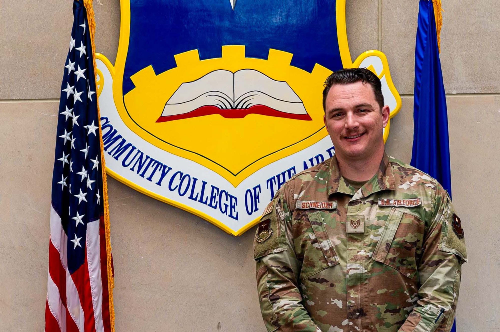 U.S. Air Force Tech. Sgt. Grant Schneider, Community College of the Air Force non-commissioned officer in charge of Aviation Maintenance Technology degrees program, poses for a photo at Maxwell-Gunter Annex, Alabama, March 5, 2025.